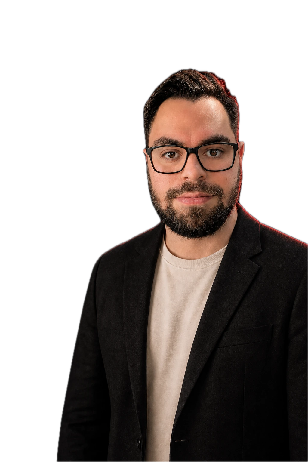 Harrison Olvera wearing black glasses and a charcoal blazer